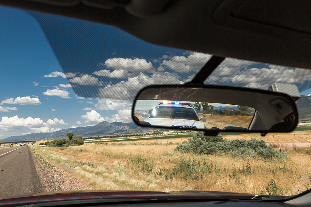 Police pulling over vehicle on the streets