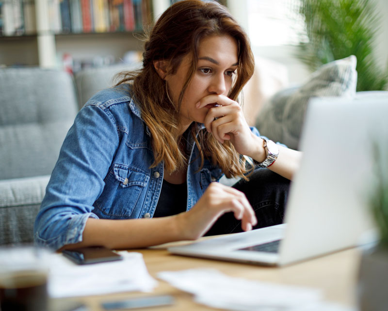 Worried Young women on her computer taking one of the self Surveys